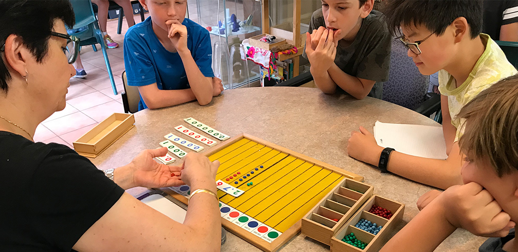 Writing with small moveable letters, the Montessori way.