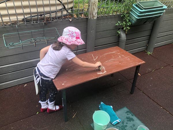 Pre-Primary - cleaning a table